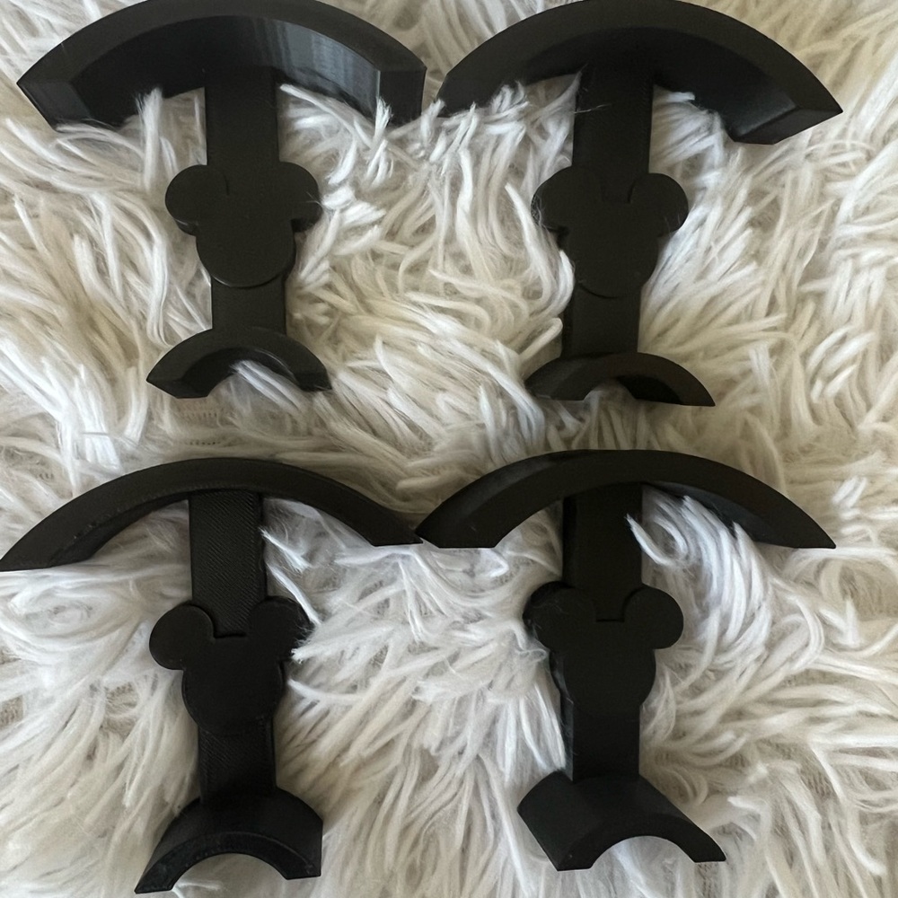 4 black Loungefly and Ear Display Hooks with Command Strips